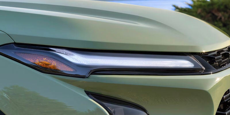 The headlight detail on the 2025 Chevrolet Trax in Wentzville, MO