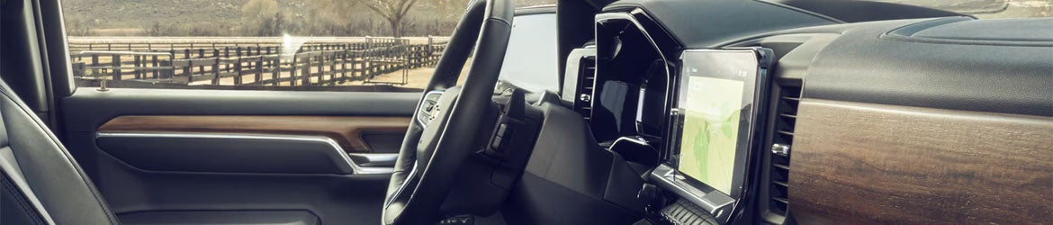2026 Chevrolet Silverado 1500 interior steering wheel in Wentzville MO with integrated driver controls and digital instrument cluster