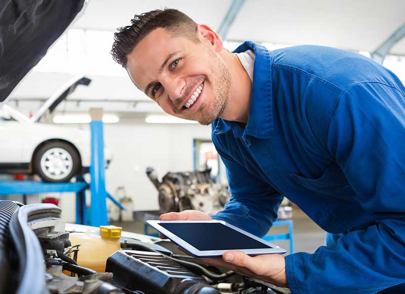 Mechanic servicing a car